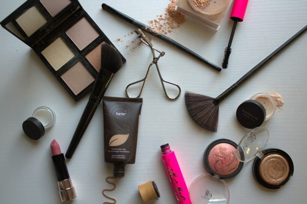 Assorted makeup and cosmetics on a tabletop