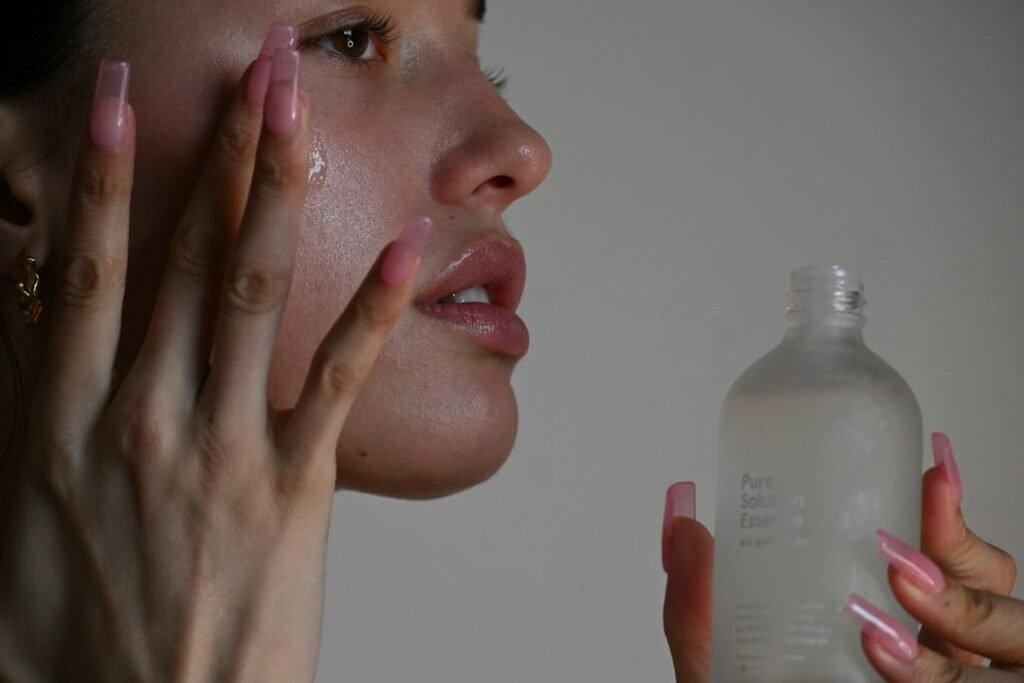 Serum applied to skin in a beauty editorial