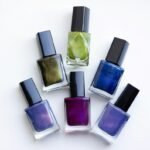 Glass bottles of nail polish in an editorial arrangement
