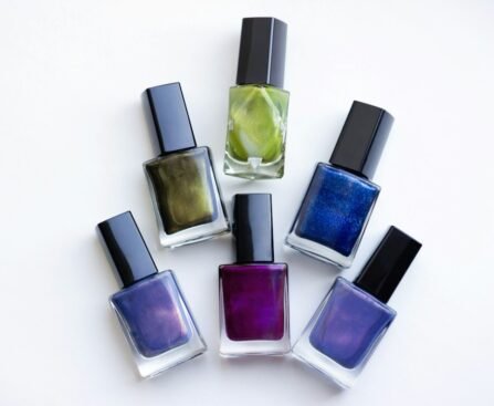 Glass bottles of nail polish in an editorial arrangement