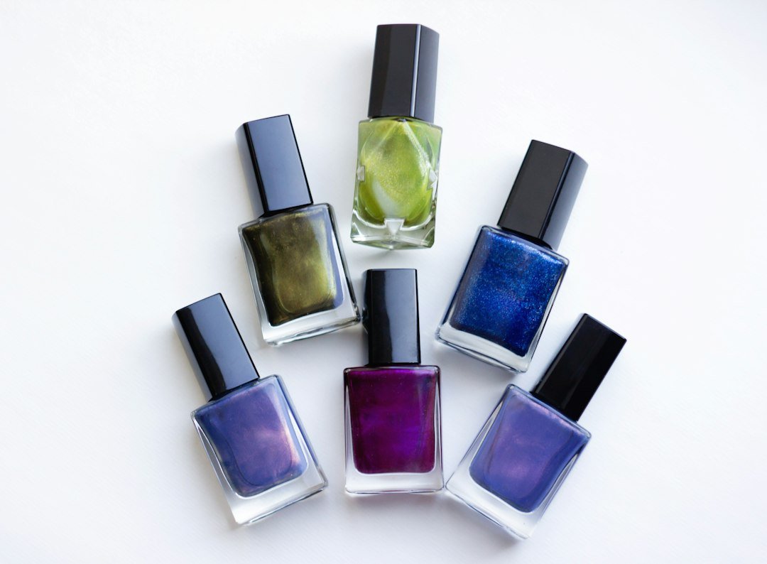 Glass bottles of nail polish in an editorial arrangement